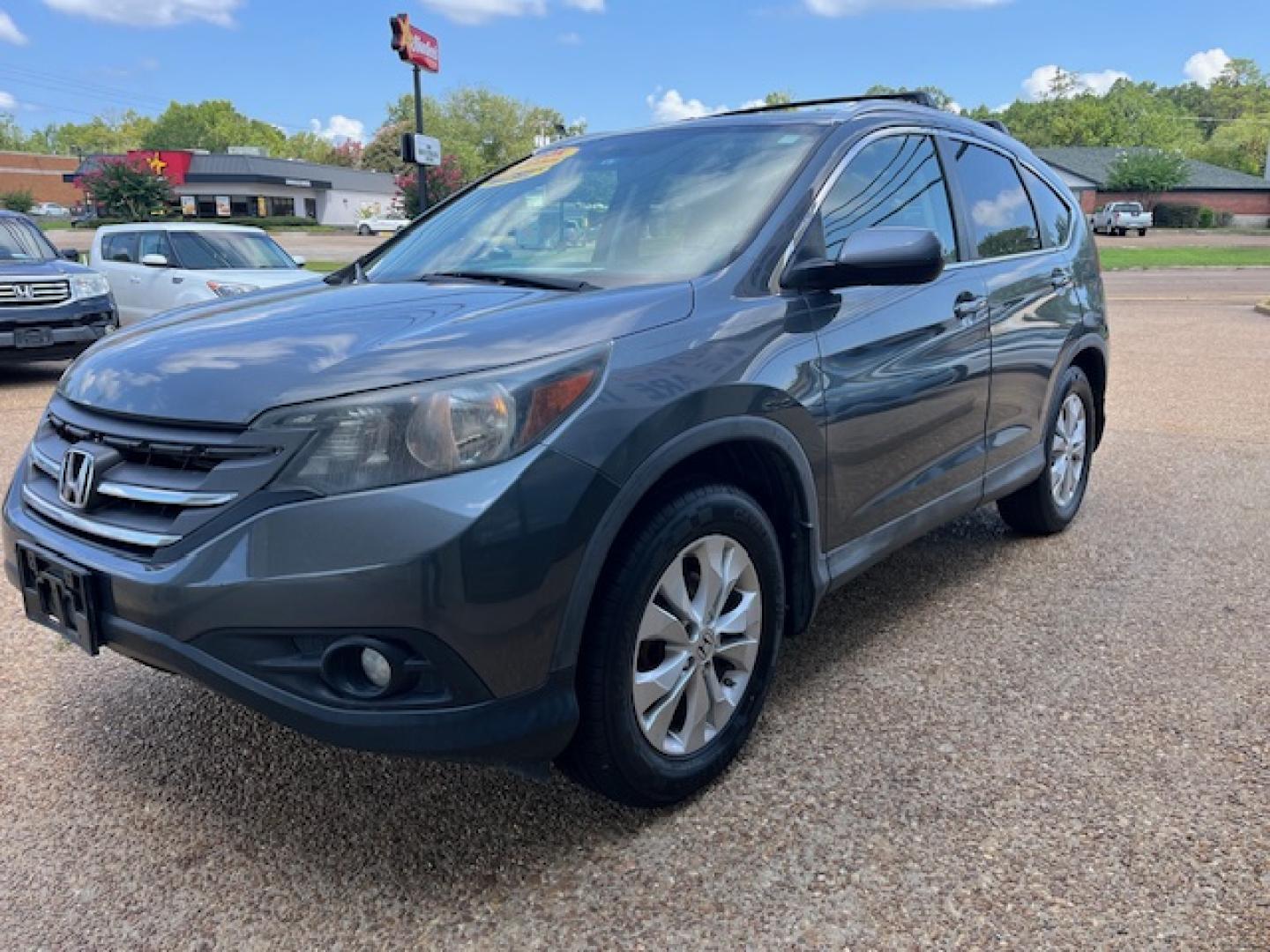 2012 GRAY HONDA CR-V EX-L (2HKRM3H78CH) with an 2.4L L4 DOHC 16V engine, 5-Speed Automatic transmission, located at 922 W. Beacon St., Philadelphia, MS, 39350, (601) 650-3675, 32.770447, -89.127151 - Title: 2012 Honda CR-V EX-L Year: 2012 Make: Honda Model: CR-V Engine: 2.4L L4 DOHC 16V Body: SPORT UTILITY 4-DR Transmission: 5-Speed Automatic Drive Type: FWD Mpg City: 23 Mpg: 31 Trim: EX-L 5-Speed AT - Photo#1