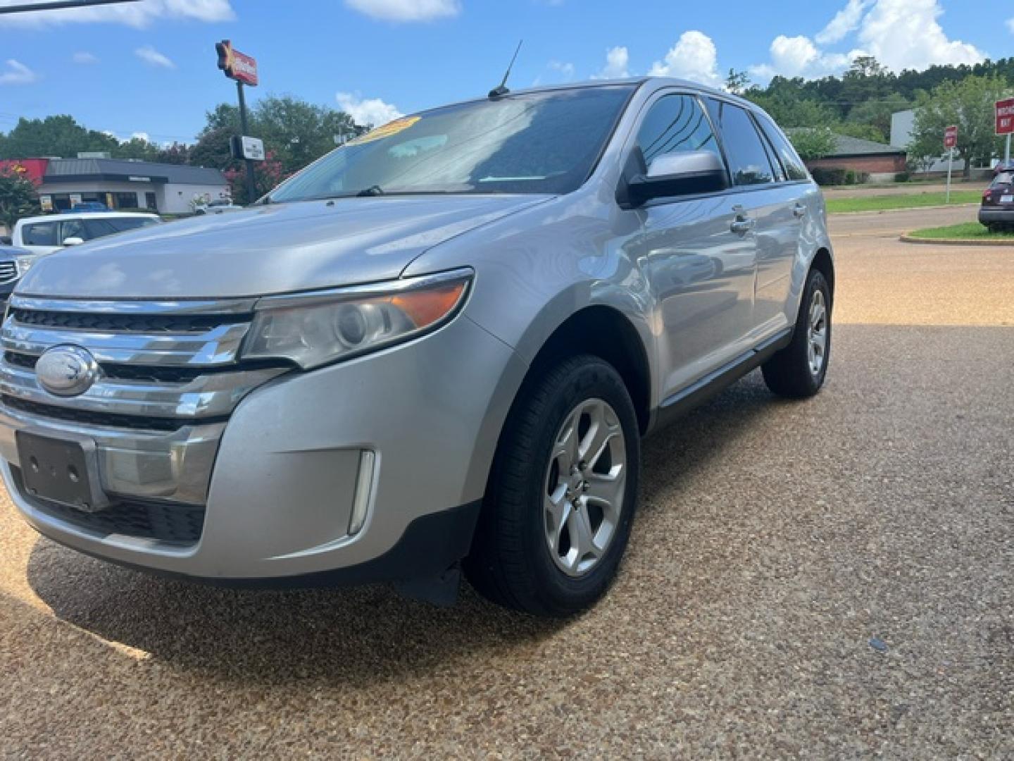 2013 SILVER /Black w/ Leather seats FORD EDGE SEL SEL (2FMDK3JC6DB) with an 3.5L V6 DOHC 24V engine, 6- Speed automatic transmission, located at 922 W. Beacon St., Philadelphia, MS, 39350, (601) 650-3675, 32.770447, -89.127151 - Title:2013 Ford Edge SEL FWD Year:2013 Make: Ford Model: Edge Engine:3.5L V6 DOHC 24V Body: SPORT UTILITY 4-DR Transmission:6-Speed Automatic Drive Type: FWD Mpg City:21 Mpg:30 Trim: SEL Seat: 7 w/ Third row - Photo#1