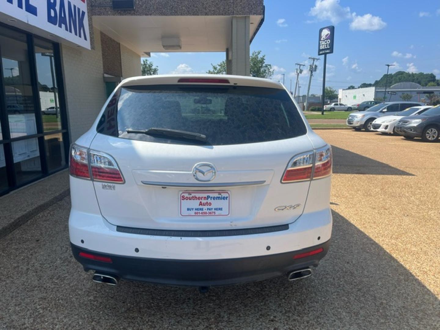 2012 WHITE MAZDA CX-9 GRAND TOURING Grand Touring (JM3TB2DA3C0) with an 3.7L V6 DOHC 24V engine, 6-Speed Automatic transmission, located at 922 W. Beacon St., Philadelphia, MS, 39350, (601) 650-3675, 32.770447, -89.127151 - Title: 2012 Mazda CX-9 Grand Touring Year: 2012 Make: Mazda Model: CX-9 Engine: 3.7L V6 DOHC 24V Body: SPORT UTILITY 4-DR Transmission: 6-Speed Automatic Drive Type: FWD Mpg City: 17 Mpg: 24 Trim: Grand Touring - Photo#3