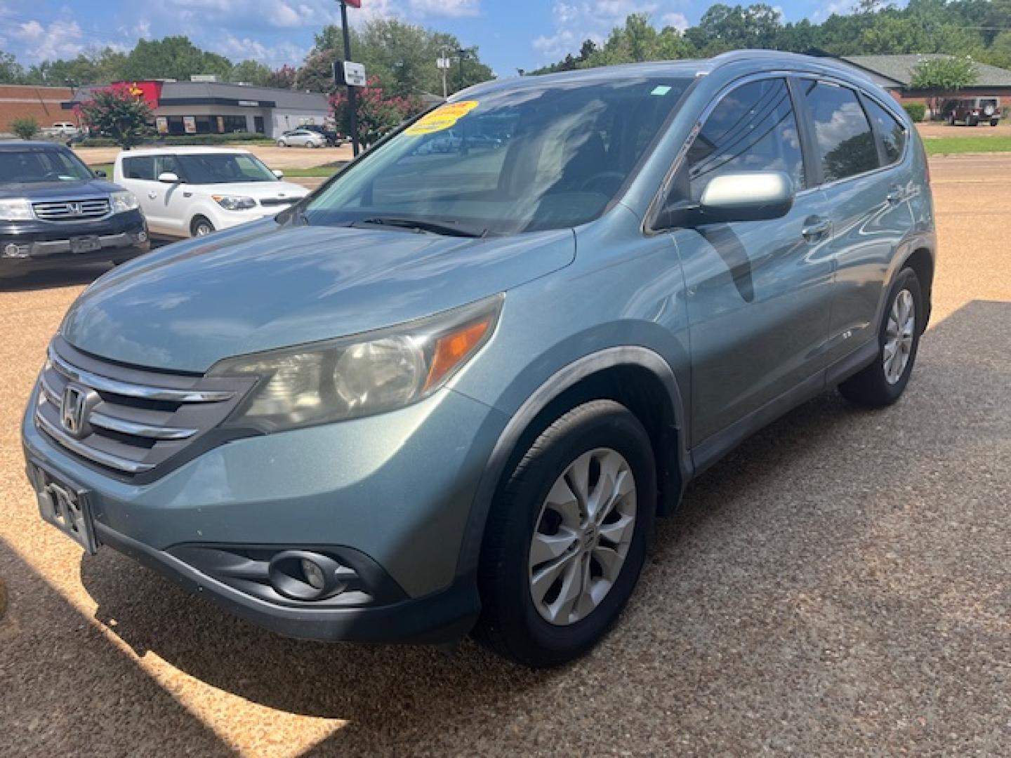 2012 GRAY HONDA CR-V EX-L EX (5J6RM3H72CL) with an 2.4L L4 DOHC 16V engine, 5-Speed Automatic transmission, located at 922 W. Beacon St., Philadelphia, MS, 39350, (601) 650-3675, 32.770447, -89.127151 - Title: 2012 Honda CR-V EX-L Year: 2012 Make: Honda Model: CR-V Engine: 2.4L L4 DOHC 16V Body: SPORT UTILITY 4-DR Transmission: 5-Speed Automatic Drive Type: FWD Mpg City: 23 Mpg: 31 Trim: EX-L - Photo#1