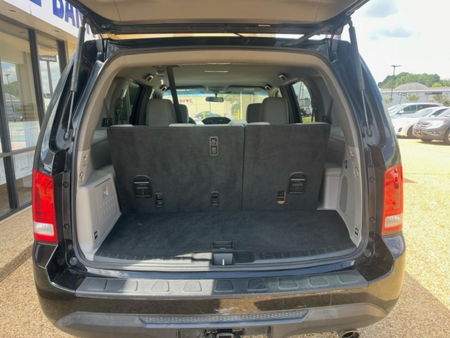 2013 BLACK HONDA PILOT EX EX (5FNYF3H46DB) with an 3.5L V6 SOHC 24V engine, 5-Speed Automatic transmission, located at 922 W. Beacon St., Philadelphia, MS, 39350, (601) 650-3675, 32.770447, -89.127151 - Title: 2013 Honda Pilot EX Year: 2013 Make: Honda Model: Pilot Engine: 3.5L V6 SOHC 24V Body: SPORT UTILITY 4-DR Transmission: 5-Speed Automatic Drive Type: FWD Mpg City: 18 Mpg: 25 Trim: EX - Photo#3