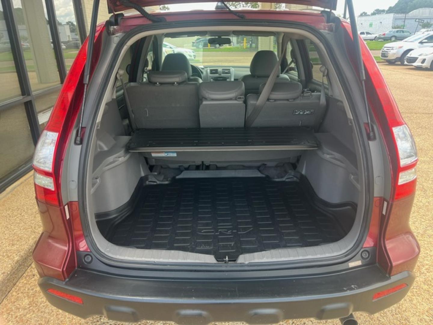 2009 RED HONDA CR-V EX-L EX-L (5J6RE38739L) with an 2.4L L4 DOHC 16V engine, 5-Speed Automatic transmission, located at 922 W. Beacon St., Philadelphia, MS, 39350, (601) 650-3675, 32.770447, -89.127151 - Title: 2009 Honda CR-V EX-L Year: 2009 Make: Honda Model: CR-V Engine: 2.4L L4 DOHC 16V Body: SPORT UTILITY 4-DR Transmission: 5-Speed Automatic Overdrive Drive Type: FWD Mpg City: 20 Mpg: 27 Trim: EX-L 2WD - Photo#7