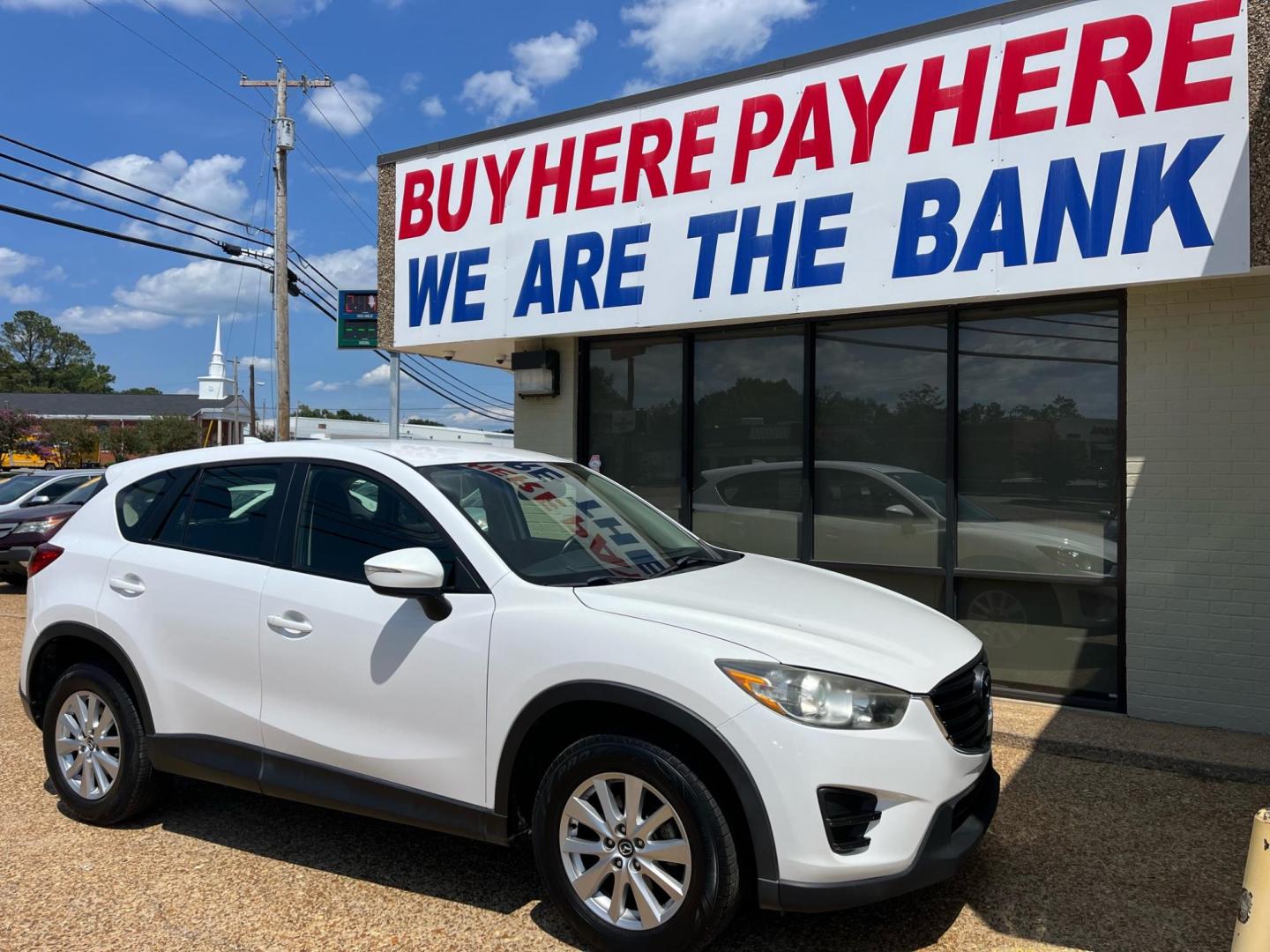 2016 WHITE /Grey MAZDA CX-5 SPORT Sport (JM3KE2BY6G0) with an 2.5L L4 DOHC 16V engine, 6-Speed Automatic transmission, located at 922 W. Beacon St., Philadelphia, MS, 39350, (601) 650-3675, 32.770447, -89.127151 - Title: 2016 Mazda CX-5 Sport AT Year: 2016 Make: Mazda Model: CX-5 Engine: 2.5L L4 DOHC 16V Body: SPORT UTILITY 4-DR Transmission: 6-Speed Automatic Drive Type: FWD Mpg City: 26 Mpg: 33 Trim: Sport AT - Photo#0