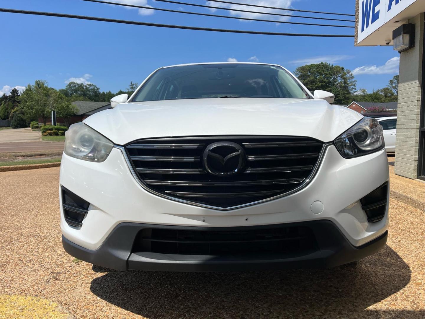 2016 WHITE /Grey MAZDA CX-5 SPORT Sport (JM3KE2BY6G0) with an 2.5L L4 DOHC 16V engine, 6-Speed Automatic transmission, located at 922 W. Beacon St., Philadelphia, MS, 39350, (601) 650-3675, 32.770447, -89.127151 - Title: 2016 Mazda CX-5 Sport AT Year: 2016 Make: Mazda Model: CX-5 Engine: 2.5L L4 DOHC 16V Body: SPORT UTILITY 4-DR Transmission: 6-Speed Automatic Drive Type: FWD Mpg City: 26 Mpg: 33 Trim: Sport AT - Photo#1