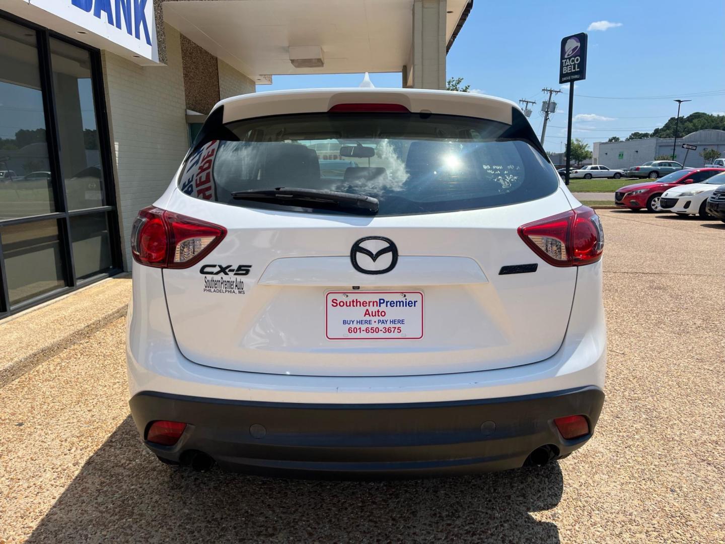 2016 WHITE /Grey MAZDA CX-5 SPORT Sport (JM3KE2BY6G0) with an 2.5L L4 DOHC 16V engine, 6-Speed Automatic transmission, located at 922 W. Beacon St., Philadelphia, MS, 39350, (601) 650-3675, 32.770447, -89.127151 - Title: 2016 Mazda CX-5 Sport AT Year: 2016 Make: Mazda Model: CX-5 Engine: 2.5L L4 DOHC 16V Body: SPORT UTILITY 4-DR Transmission: 6-Speed Automatic Drive Type: FWD Mpg City: 26 Mpg: 33 Trim: Sport AT - Photo#3