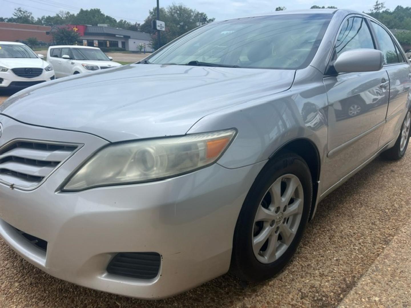 2011 SILVER TOYOTA CAMRY BASE; SE; LE; Base (4T4BF3EKXBR) with an 2.5L L4 DOHC 16V engine, 6-Speed Automatic transmission, located at 922 W. Beacon St., Philadelphia, MS, 39350, (601) 650-3675, 32.770447, -89.127151 - Title: 2011 Toyota Camry Base 6-Spd AT Year: 2011 Make: Toyota Model: Camry Engine: 2.5L L4 DOHC 16V Body: SEDAN 4-DR Transmission: 6-Speed Automatic Drive Type: FWD Mpg City: 22 Mpg: 32 Trim: Base 6-Spd AT - Photo#1