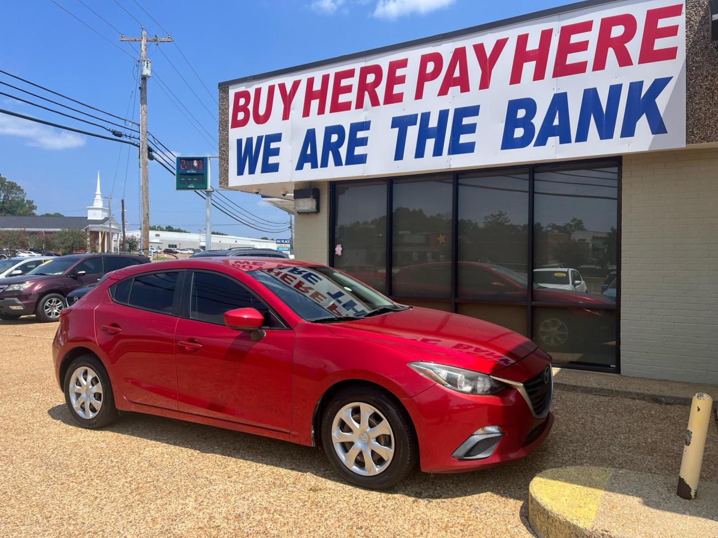 2015 RED /Black MAZDA MAZDA3 S SPORT Sport (3MZBM1K70FM) with an 2.0L L4 DOHC 16V engine, 6-Speed Automatic transmission, located at 922 W. Beacon St., Philadelphia, MS, 39350, (601) 650-3675, 32.770447, -89.127151 - Title: 2015 Mazda MAZDA3 i Sport Year: 2015 Make: Mazda Model: MAZDA 3 Engine: 2.0L L4 DOHC 16V Body: HATCHBACK 5-DR Transmission: 6-Speed automatic Drive Type: FWD Mpg City: 29 Mpg: 40 Trim: I Sport MT 5-Door - Photo#0