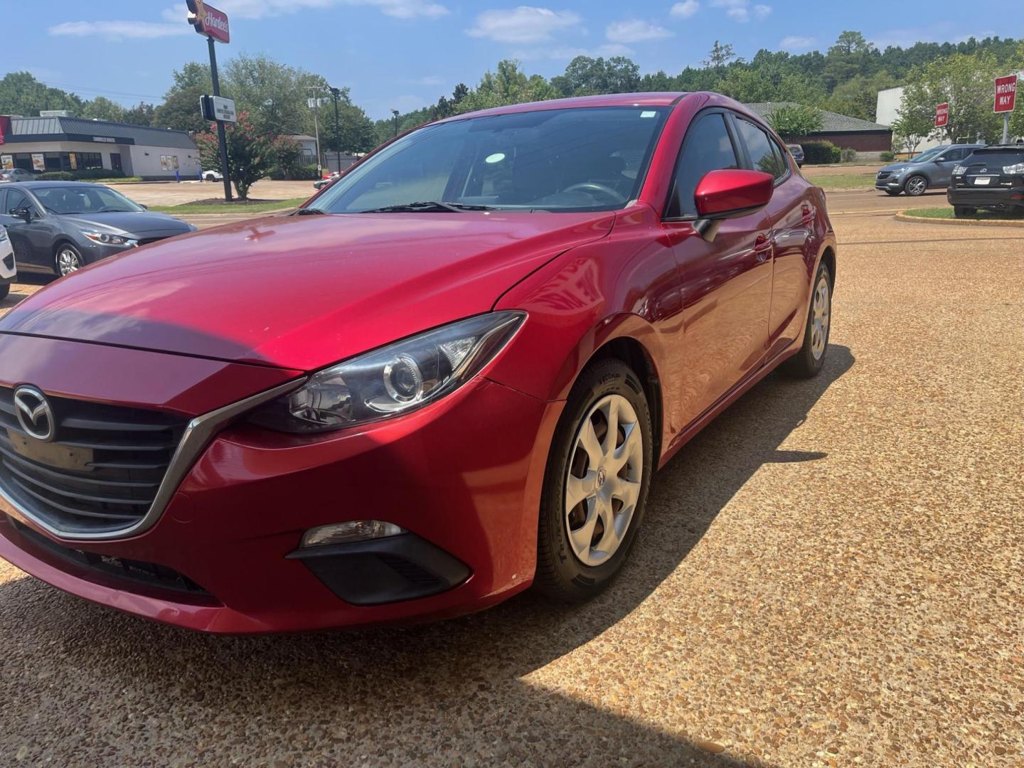 2015 RED /Black MAZDA MAZDA3 S SPORT Sport (3MZBM1K70FM) with an 2.0L L4 DOHC 16V engine, 6-Speed Automatic transmission, located at 922 W. Beacon St., Philadelphia, MS, 39350, (601) 650-3675, 32.770447, -89.127151 - Title: 2015 Mazda MAZDA3 i Sport Year: 2015 Make: Mazda Model: MAZDA 3 Engine: 2.0L L4 DOHC 16V Body: HATCHBACK 5-DR Transmission: 6-Speed automatic Drive Type: FWD Mpg City: 29 Mpg: 40 Trim: I Sport MT 5-Door - Photo#2