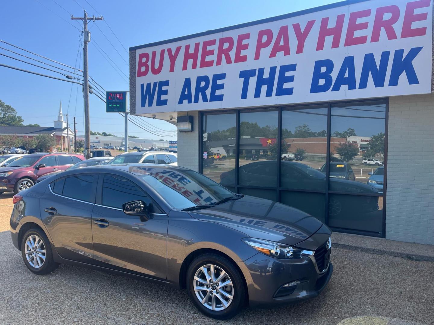 2018 GRAY /Black MAZDA MAZDA3 SPORT Sport (3MZBN1U77JM) with an 2.0L L4 DOHC 16V engine, 6-Speed Automatic transmission, located at 922 W. Beacon St., Philadelphia, MS, 39350, (601) 650-3675, 32.770447, -89.127151 - Title: 2018 Mazda 3 I Sport Year: 2018 Make: Mazda Model: 3 I Sport Engine:2.0L L4 DOHC 16V Body: SEDAN Transmission: 6 Speed Automatic Drive Type: FWD Trim: I Sport MT - Photo#0