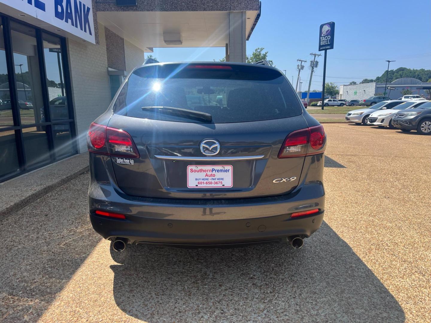 2013 GRAY MAZDA CX-9 GRAND TOURING Grand Touring (JM3TB2DAXD0) with an 3.7L V6 DOHC 24V engine, 6-Speed Automatic transmission, located at 922 W. Beacon St., Philadelphia, MS, 39350, (601) 650-3675, 32.770447, -89.127151 - Title: 2013 Mazda CX-9 Grand Touring Year: 2013 Make: Mazda Model: CX-9 Engine: 3.7L V6 DOHC 24V Body: SPORT UTILITY Transmission: 6-Speed Automatic Drive Type: FWD Mpg City: 17 Mpg: 24 Trim: Grand Touring Third Row Seating - Photo#3