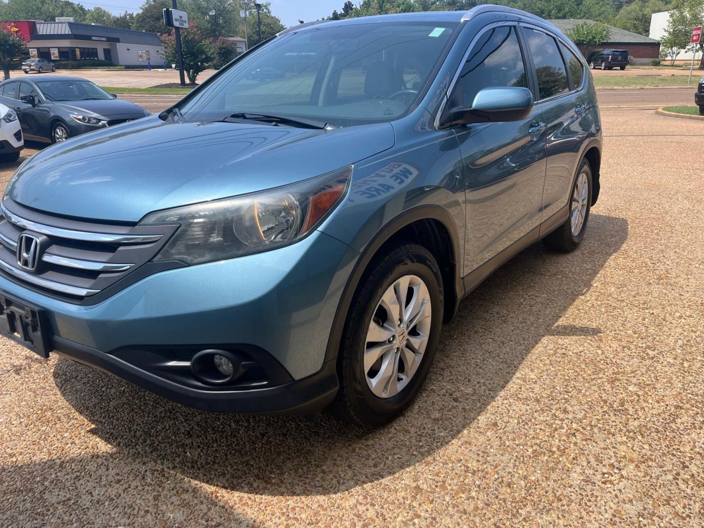 2014 BLUE HONDA CR-V EX-L (2HKRM3H71EH) , located at 922 W. Beacon St., Philadelphia, MS, 39350, (601) 650-3675, 32.770447, -89.127151 - Photo#1