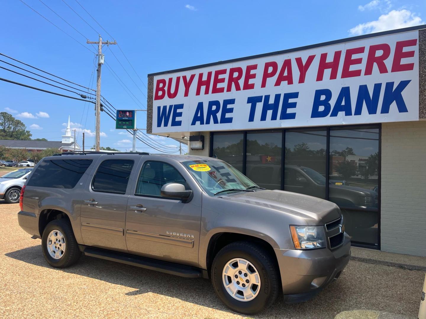 2012 BROWN CHEVROLET SUBURBAN LT LT (1GNSCJE04CR) with an 5.3L V8 OHV 16V FFV engine, 6-Speed Automatic transmission, located at 922 W. Beacon St., Philadelphia, MS, 39350, (601) 650-3675, 32.770447, -89.127151 - Title: 2012 Chevrolet Suburban LT Year: 2012 Make: Chevrolet Model: Suburban Engine:5.3L V8 OHV 16V FFV Body: SPORT UTILITY Transmission: 6-Speed Automatic Drive Type: RWD Mpg City: 15 Mpg: 21 Trim: LT Third Row Seating - Photo#0