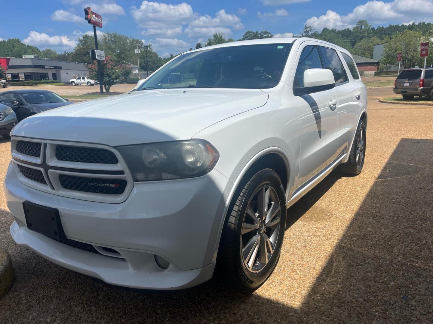 2013 WHITE /Black DODGE DURANGO SXT SXT (1C4RDJAGXDC) with an 3.6L V6 DOHC 24V engine, 5-Speed Automatic transmission, located at 922 W. Beacon St., Philadelphia, MS, 39350, (601) 650-3675, 32.770447, -89.127151 - Title: 2013 Dodge Durango SXT Year: 2013 Make: Dodge Model: Durango Engine: 3.6L V6 DOHC 24V Body: SPORT UTILITY 4-DR Transmission: 5-Speed Automatic Drive Type: AWD Mpg City: 16 Mpg: 23 Trim: SXT - Photo#1