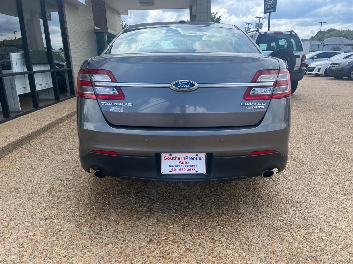 2013 GRAY /Black leather FORD TAURUS LIMITED Limited (1FAHP2F83DG) with an 3.5L V6 DOHC 24V engine, 6-Speed Automatic transmission, located at 922 W. Beacon St., Philadelphia, MS, 39350, (601) 650-3675, 32.770447, -89.127151 - Title: 2013 Ford Taurus Limited Year: 2013 Make: Ford Model: Taurus Engine: 3.5L V6 DOHC 24V Body: SEDAN 4-DR Transmission: 6-Speed Automatic Drive Type: FWD Mpg City: 19 Mpg: 29 Trim: Limited - Photo#3