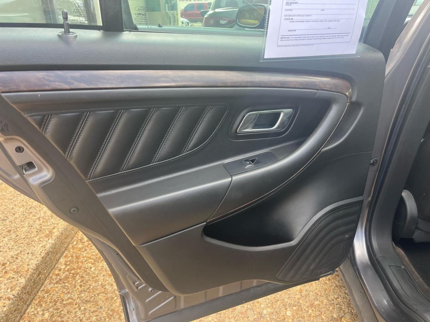 2013 GRAY /Black leather FORD TAURUS LIMITED Limited (1FAHP2F83DG) with an 3.5L V6 DOHC 24V engine, 6-Speed Automatic transmission, located at 922 W. Beacon St., Philadelphia, MS, 39350, (601) 650-3675, 32.770447, -89.127151 - Title: 2013 Ford Taurus Limited Year: 2013 Make: Ford Model: Taurus Engine: 3.5L V6 DOHC 24V Body: SEDAN 4-DR Transmission: 6-Speed Automatic Drive Type: FWD Mpg City: 19 Mpg: 29 Trim: Limited - Photo#7