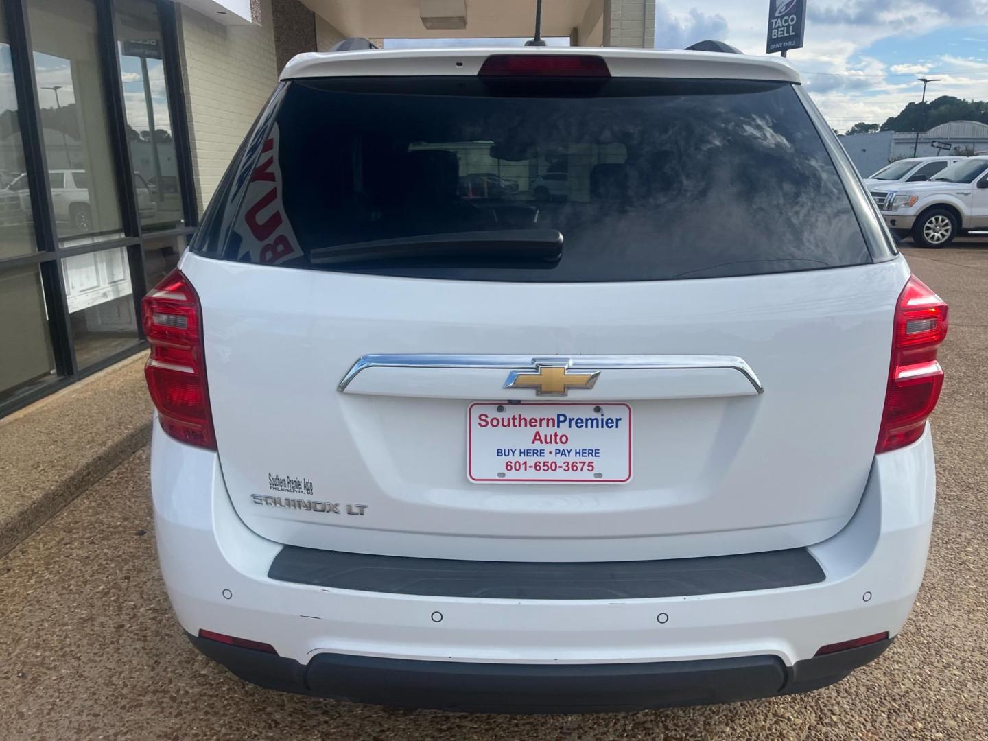 2016 WHITE CHEVROLET EQUINOX LT LT (2GNALCEK2G1) with an 2.4L L4 DOHC 16V engine, 6-Speed Automatic transmission, located at 922 W. Beacon St., Philadelphia, MS, 39350, (601) 650-3675, 32.770447, -89.127151 - Title: 2016 Chevrolet Equinox LT 2WD Year: 2016 Make: Chevrolet Model: Equinox Engine: 2.4L L4 DOHC 16V FFV Body: SPORT UTILITY 4-DR Transmission: 6A Drive Type: FWD Mpg City: 22 Mpg: 32 Trim: LT 2WD - Photo#3