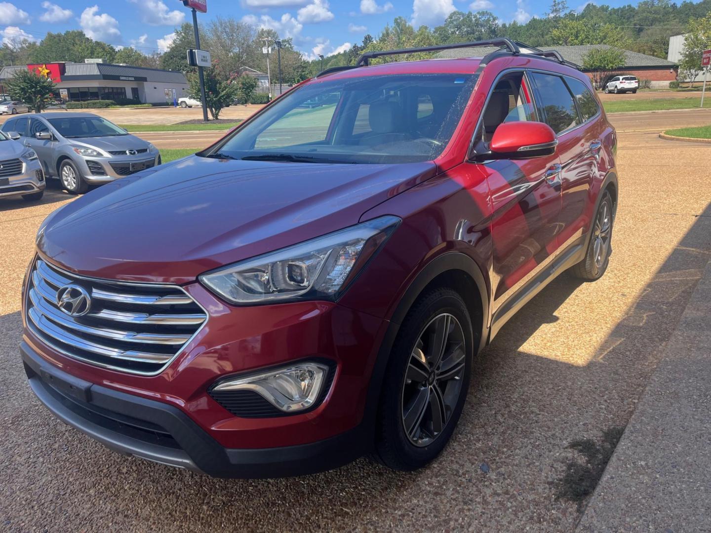 2014 RED HYUNDAI SANTA FE XL GLS; LIM Limited (KM8SN4HF5EU) with an 3.3L V6 DOHC 24V engine, 6-Speed Automatic transmission, located at 922 W. Beacon St., Philadelphia, MS, 39350, (601) 650-3675, 32.770447, -89.127151 - Title: 2014 Hyundai Santa Fe GLS FWD Year: 2014 Make: Hyundai Model: Santa Fe Engine: 3.3L V6 DOHC 24V Body: SPORT UTILITY 4-DR Transmission: 6-Speed Automatic Drive Type: FWD Mpg City: 18 Mpg: 25 Trim: GLS FWD - Photo#1