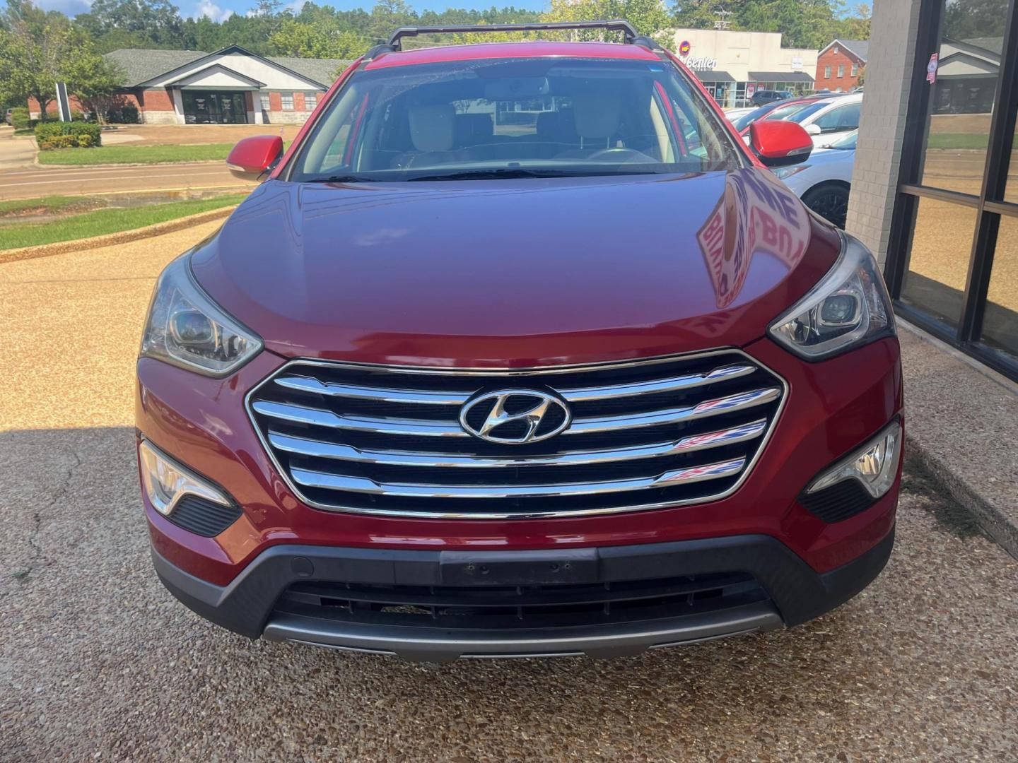 2014 RED HYUNDAI SANTA FE XL GLS; LIM Limited (KM8SN4HF5EU) with an 3.3L V6 DOHC 24V engine, 6-Speed Automatic transmission, located at 922 W. Beacon St., Philadelphia, MS, 39350, (601) 650-3675, 32.770447, -89.127151 - Title: 2014 Hyundai Santa Fe GLS FWD Year: 2014 Make: Hyundai Model: Santa Fe Engine: 3.3L V6 DOHC 24V Body: SPORT UTILITY 4-DR Transmission: 6-Speed Automatic Drive Type: FWD Mpg City: 18 Mpg: 25 Trim: GLS FWD - Photo#2