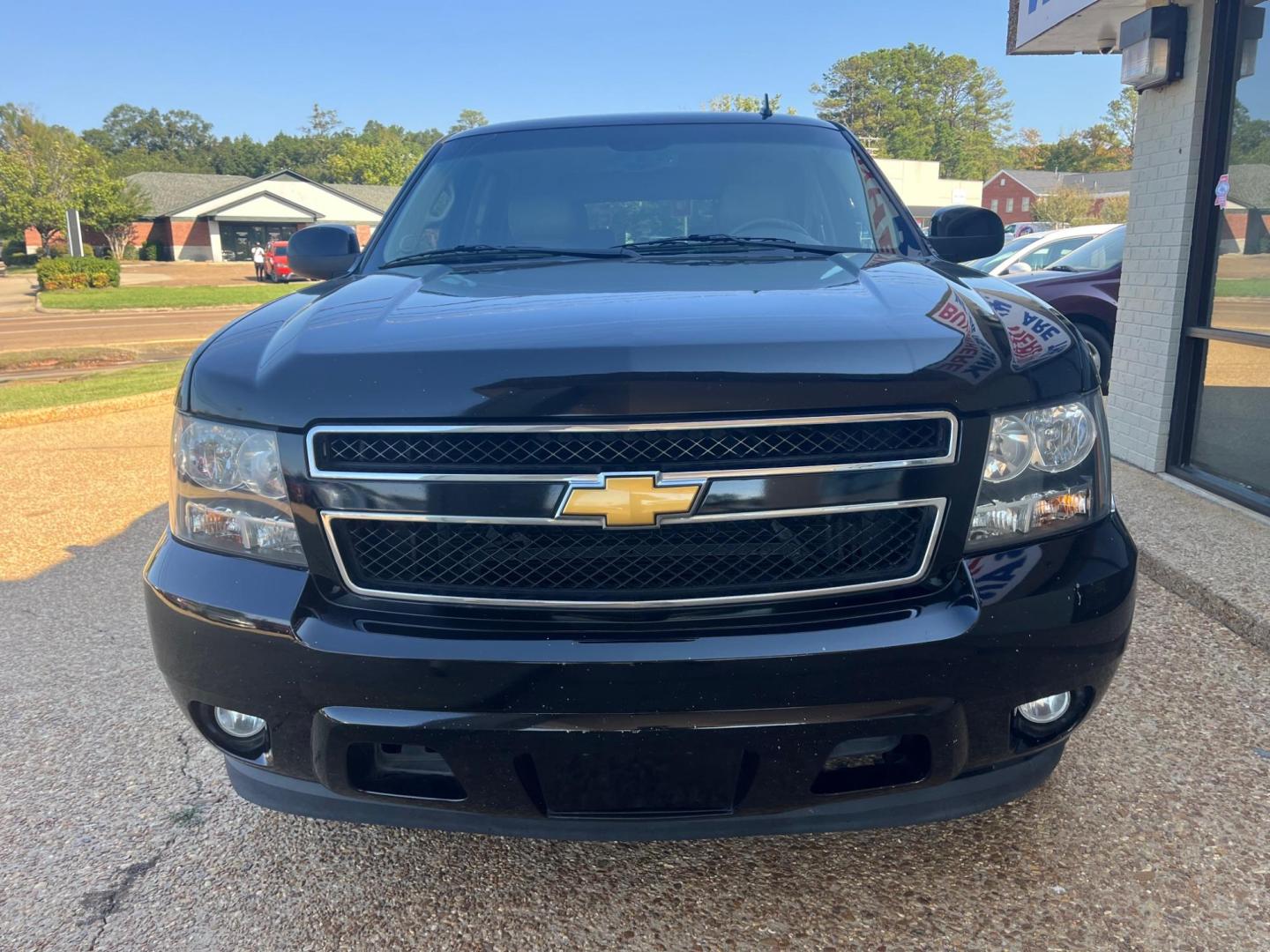 2012 BLACK /Tan leather CHEVROLET TAHOE LT LT (1GNSCBE07CR) with an 5.3L V8 OHV 16V FFV engine, 6-Speed Automatic transmission, located at 922 W. Beacon St., Philadelphia, MS, 39350, (601) 650-3675, 32.770447, -89.127151 - Title: 2012 Chevrolet Tahoe LT Year: 2012 Make: Chevrolet Model: Tahoe Engine: 5.3L V8 OHV 16V FFV Body: SPORT UTILITY 4-DR Transmission: 6-Speed Automatic Drive Type: RWD Mpg City: 15 Mpg: 21 Trim: LT - Photo#1