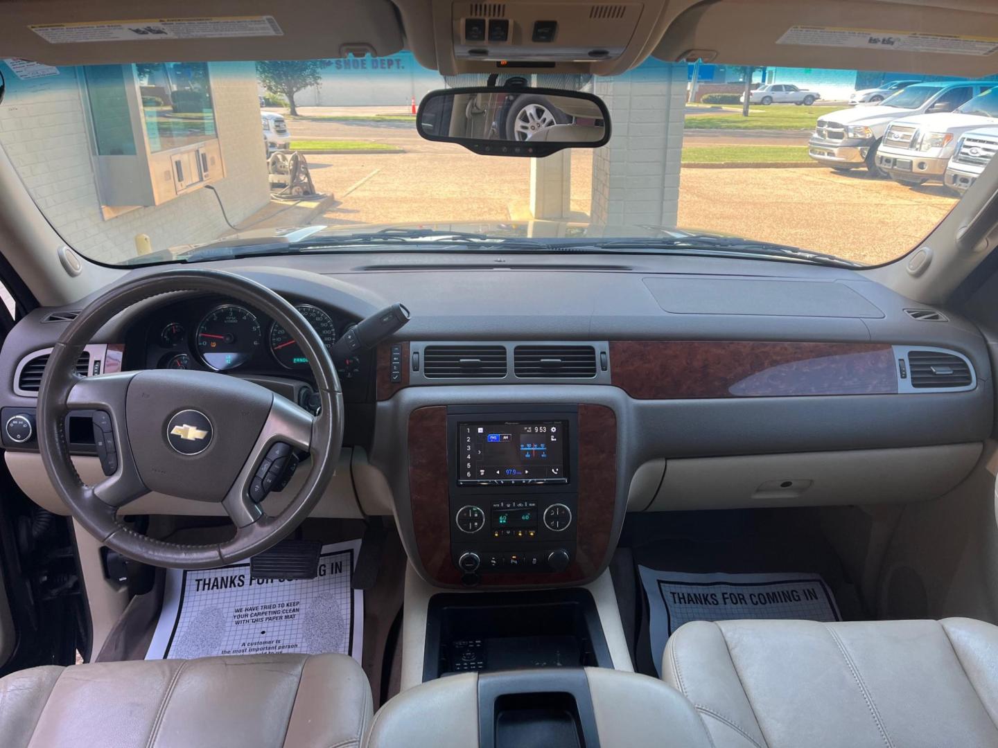 2012 BLACK /Tan leather CHEVROLET TAHOE LT LT (1GNSCBE07CR) with an 5.3L V8 OHV 16V FFV engine, 6-Speed Automatic transmission, located at 922 W. Beacon St., Philadelphia, MS, 39350, (601) 650-3675, 32.770447, -89.127151 - Title: 2012 Chevrolet Tahoe LT Year: 2012 Make: Chevrolet Model: Tahoe Engine: 5.3L V8 OHV 16V FFV Body: SPORT UTILITY 4-DR Transmission: 6-Speed Automatic Drive Type: RWD Mpg City: 15 Mpg: 21 Trim: LT - Photo#6