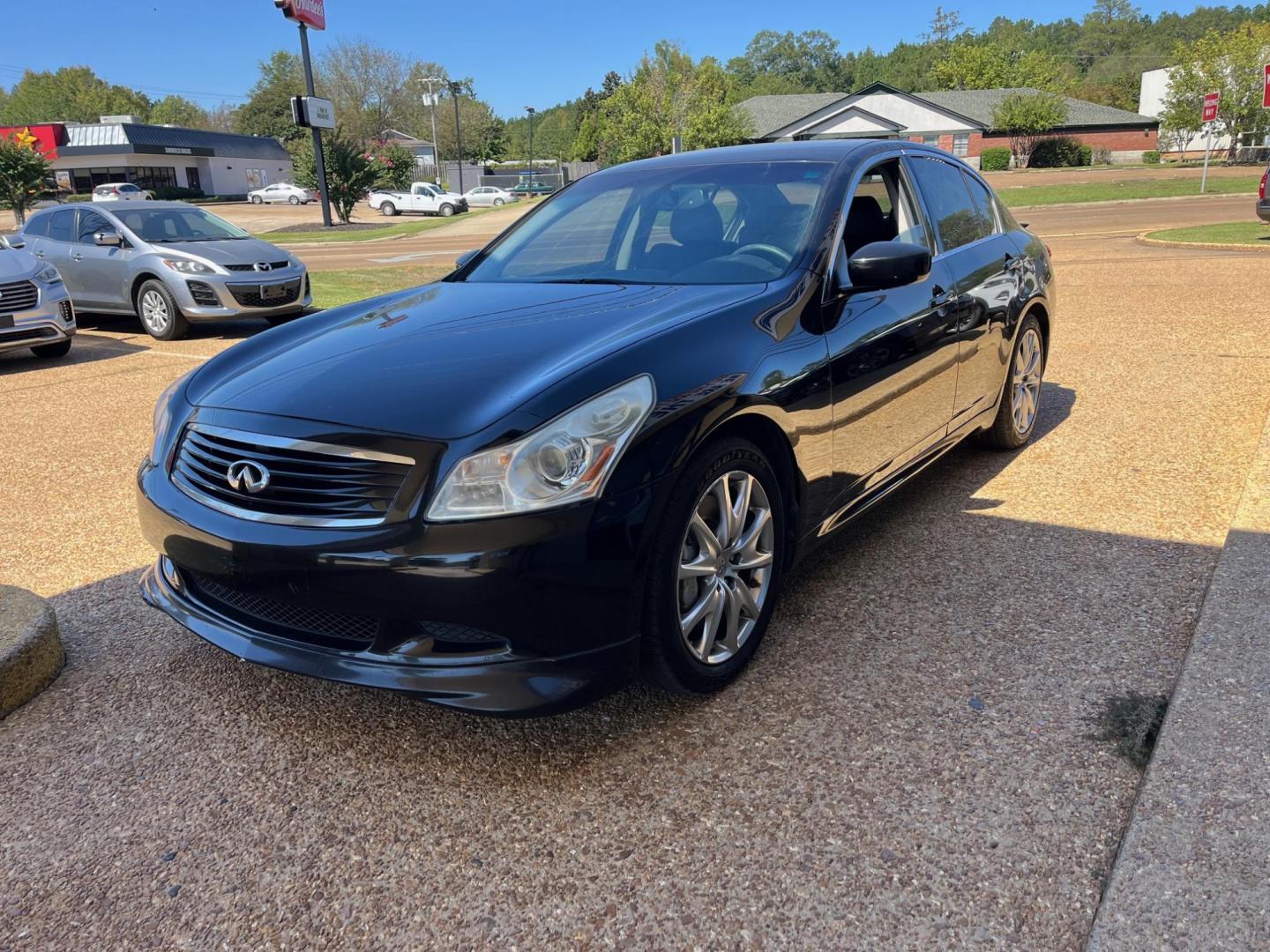 2009 BLACK INFINITI G37 BASE; SPORT; JOU G 37 SEDAN (JNKCV61E29M) with an 3.7L V6 DOHC 24V engine, 5-Speed Automatic transmission, located at 922 W. Beacon St., Philadelphia, MS, 39350, (601) 650-3675, 32.770447, -89.127151 - Title: 2009 Infiniti G 37 Sedan Year: 2009 Make: Infiniti Model: G Sedan Engine: 3.7L V6 DOHC 24V Body: COUPE 2-DR Transmission: 5-Speed Automatic Drive Type: RWD Mpg City: 18 Mpg: 26 - Photo#2