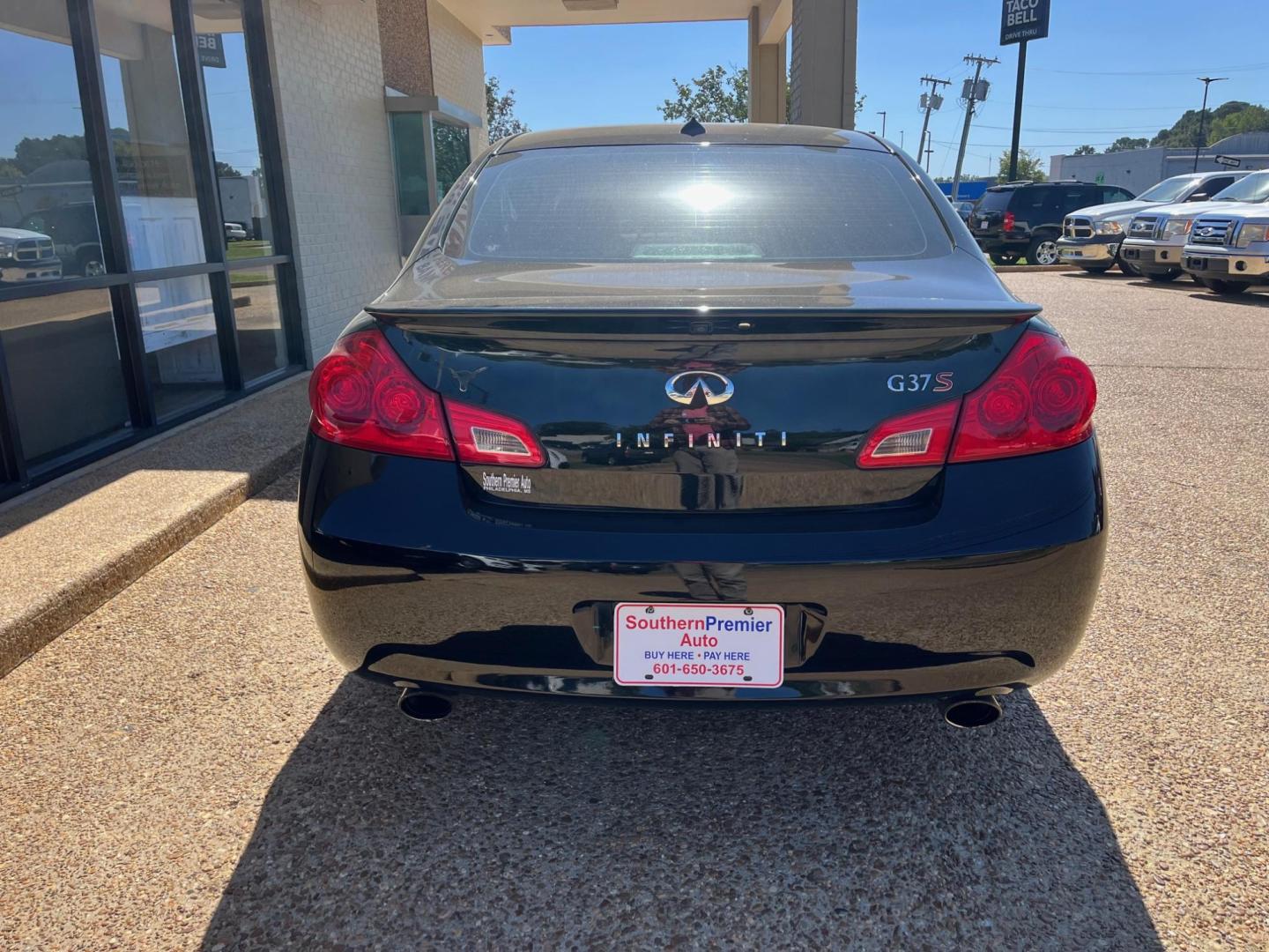 2009 BLACK INFINITI G37 BASE; SPORT; JOU G 37 SEDAN (JNKCV61E29M) with an 3.7L V6 DOHC 24V engine, 5-Speed Automatic transmission, located at 922 W. Beacon St., Philadelphia, MS, 39350, (601) 650-3675, 32.770447, -89.127151 - Title: 2009 Infiniti G 37 Sedan Year: 2009 Make: Infiniti Model: G Sedan Engine: 3.7L V6 DOHC 24V Body: COUPE 2-DR Transmission: 5-Speed Automatic Drive Type: RWD Mpg City: 18 Mpg: 26 - Photo#3